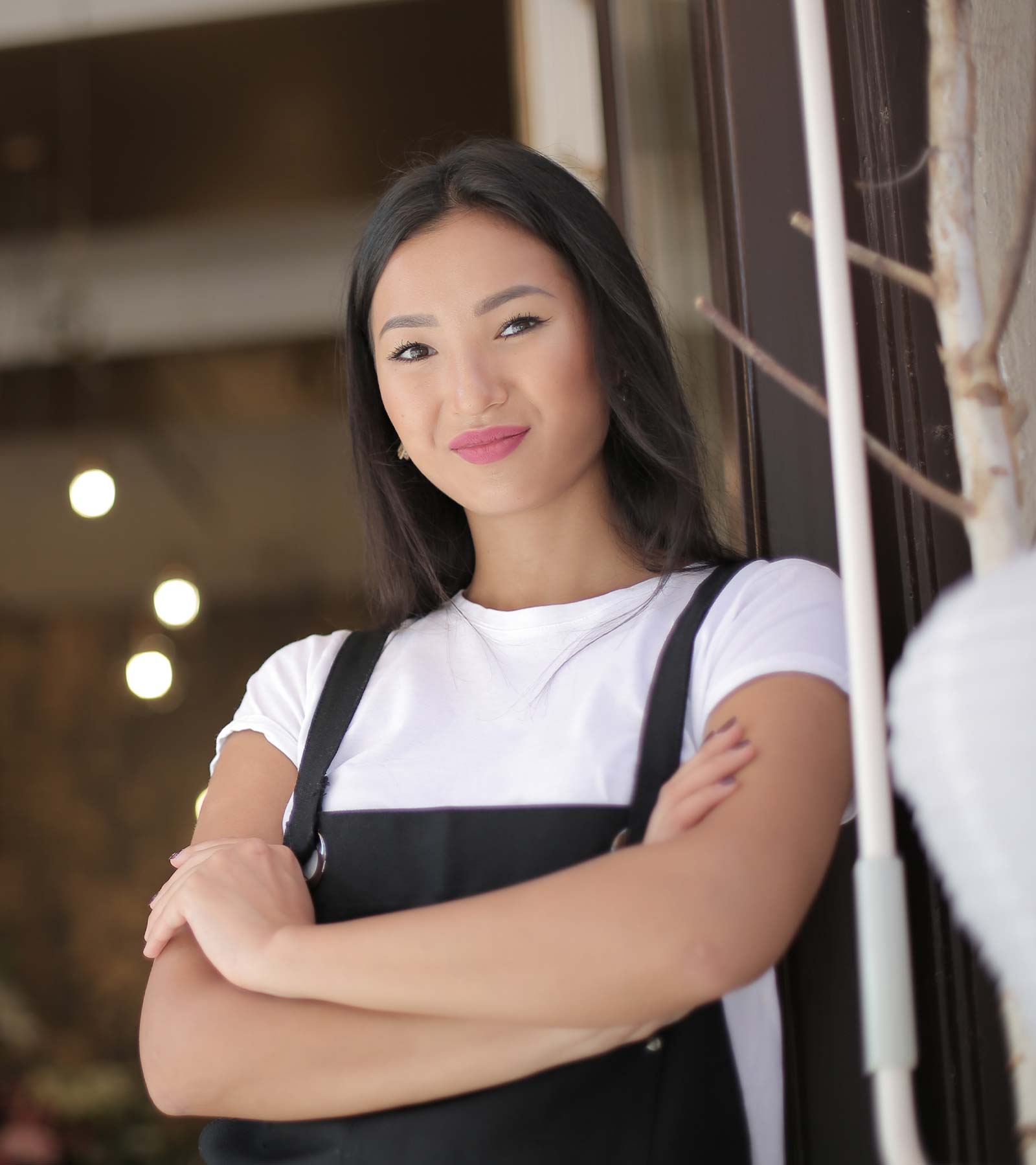 Woman Standing with her Arms Crossed